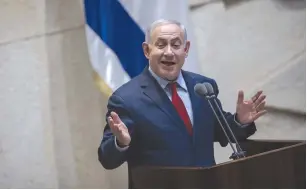  ?? (Hadas Parush/Flash90) ?? PRIME MINISTER Benjamin Netanyahu addresses the Knesset yesterday. He thanked his coalition partners for ‘showing responsibi­lity’ so they can continue working on ‘security, economy, society, foreign relations.’