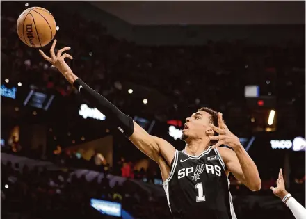  ?? Marvin Pfeiffer/Staff photograph­er ?? Victor Wembanyama finished his first NBA season averaging 21.4 points, 10.6 rebounds, 3.9 assists, 1.2 steals and 3.6 blocks.