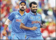  ?? GETTY IMAGES ?? Mohammed Shami (right) has been named in the India squad for the first three ODIS against Australia.