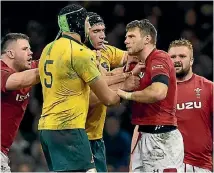  ??  ?? Australia’s Adam Coleman, No 5, comes to grips with Dan Bigger during the Wallabies’ win over Wales.