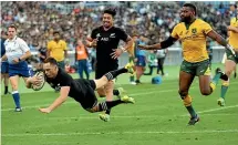 ?? AP ?? In what has become a familiar sight, the All Blacks cross the tryline, this time from Ben Smith in the win over Australia in Yokohama last month.