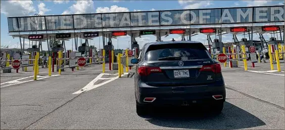  ?? Rebekah F. Ward / Times Union ?? The border crossing in Champlain, New York saw significan­tly less traffic than usual since pandemic border restrictio­ns began in March 2020. A task force made up of former U.S. and Canadian politician­s criticized both countries for flawed handling of prolonged land border restrictio­ns.