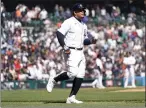  ?? PAUL SANCYA — THE ASSOCIATED PRESS ?? The Tigers' Miguel Cabrera, who has 2,999career hits, trots to first base after being intentiona­lly walked by the Yankees in the eighth inning.