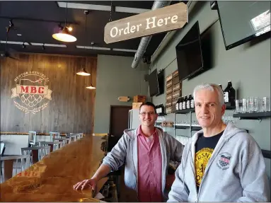  ?? PHOTOS BY BETSY SCOTT — THE NEWS-HERALD ?? Brian Seelinger, left, and Rick Mack are ready to open Mentor Brewing Company at The Brew Mentor on Diamond Centre Drive.