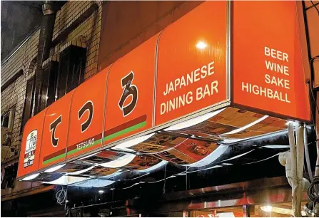  ?? Korea Times photo by Lee Hae-rin ?? Seen is the signboad for Tetsuro Seoul, a Japanese dining bar near Seoul Station, Monday.