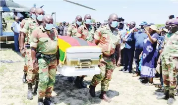  ?? — Picture: Samuel Kadungure ?? Pall-bearers carry the late national hero, Cde Kenneth Manyonda’s casket upon arrival at Chapungu Primary School in Buhera West yesterday. The late veteran politician will be buried at the National Heroes’ Acre in Harare tomorrow.