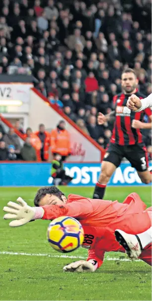  ??  ?? Comeback win: Son Heung-min scores Spurs’ third goal against Bournemout­h