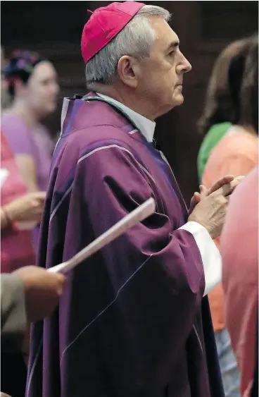  ?? MATT ROURKE / THE ASSOCIATED PRESS ?? Bishop Ronald Gainer of the Harrisburg Diocese celebrates mass at the Cathedral Parish of Saint Patrick in Harrisburg, Pa., on Friday.