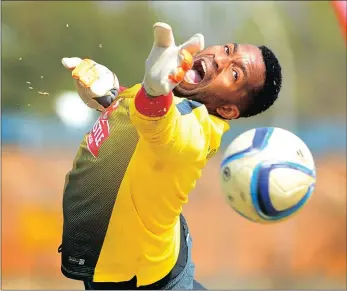  ?? PICTURE: ITUMELENG ENGLISH ?? Bafana Bafana goalkeeper Itumeleng Khune blocks a ball during a training session at AW Muller stadium at the University of Johannesbu­rg.