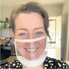  ??  ?? Clear to see Susie of Almond Hearing with a ClearMask for clients who rely on lip-reading