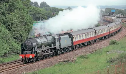  ?? NICHOLAS JOHNS ?? LMS 4-6-0 No. 46100 Royal Scot rounds the curve past Langstone Rock at Dawlish Warren with the Saphos Trains ‘English Riviera Express' from Bristol to Kingswear on June 20. The last train in the series ran on June 27 and was fully booked.