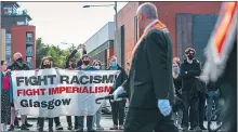  ?? Picture Andrew Cawley ?? Protesters at the Gorbals church yesterday