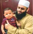  ??  ?? Qamaruddee­n with his son Ameenuddee­n.