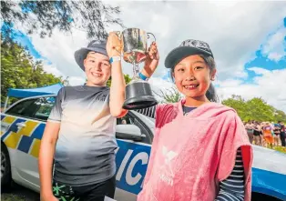  ?? ?? Taradale Primary School’s Thomas Shearer and Emma Lu are stoked with their trophy.