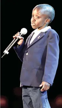  ?? REUTERS ?? THE late Nkosi Johnson, 11, addresses the XIII Internatio­nal Aids Conference at Kingsmead cricket stadium on July 9, 2000. |