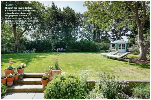  ??  ?? GARDEN
The plot the couple built on was completely barren so they ordered mature trees and hedging from Holland.
Similar sunlounger, Savannah Grey, £649, Danetti. Wrought-iron bench, £725, Susie Watson Designs