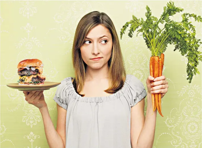  ??  ?? Brain food: both Victoria Lambert, left, and Anne Hathaway, below, turned to salmon after giving up their veganism