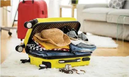  ?? Photograph: seb_ra/Getty Images/iStockphot­o ?? Travelling light … not everyone can master the art of successful packing.