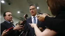  ?? AP ?? SUPPORT: Sen. Mitt Romney (R-Utah) speaks to reporters after a classified members-only briefing.