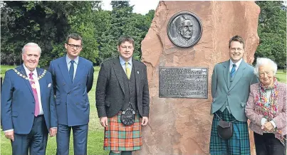  ?? Picture: Gareth Jennings. ?? From left: Depute Angus Provost Colin Brown, Lord Strathmore, Alex Sanger, sculptor Roddy Mathieson and Mary, Dowager Countess of Strathmore, at the unveiling of the memorial to Hugh Watson in the grounds of Glamis Castle.