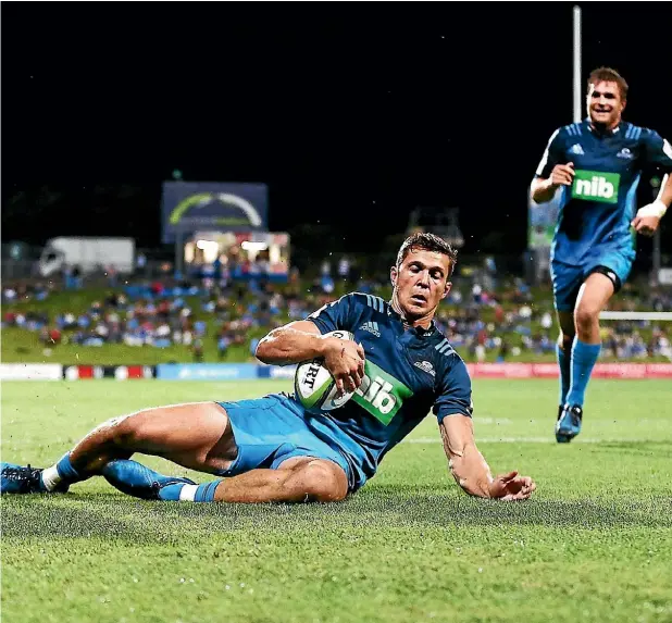  ??  ?? Matt Duffie scored two tries for the Blues against the Bulls at QBE Stadium in Albany last night.