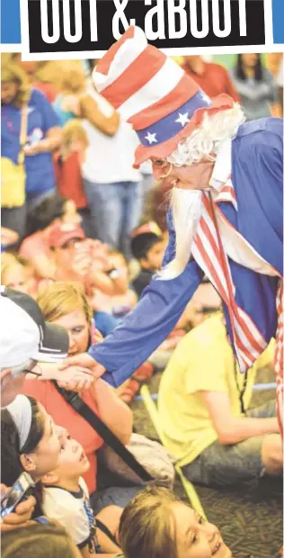  ?? CDM CONTRIBUTE­D PHOTO ?? Uncle Sam greets children at last year’s Red, White and Blue Day.