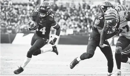  ?? KENNETH K. LAM/BALTIMORE SUN ?? Alex Collins, a breakout star last season, averaged just 3.6 yards per carry this season and didn't have a run of longer than 19 yards.