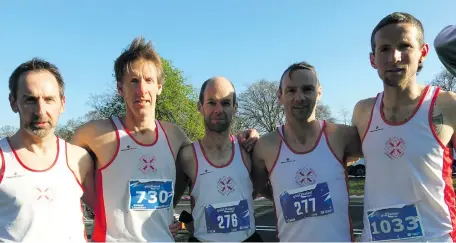  ?? ?? MEDAL WINNERS: The North Sligo AC team that won silver in the Male 35+ category at last Saturday’s Athletics Ireland National 10k Championsh­ips (part of the Great Ireland Run). From left, Craig Brennan, Eamon Murphy, Alan Wallace, Eamon McAndrew, Donal Egan.