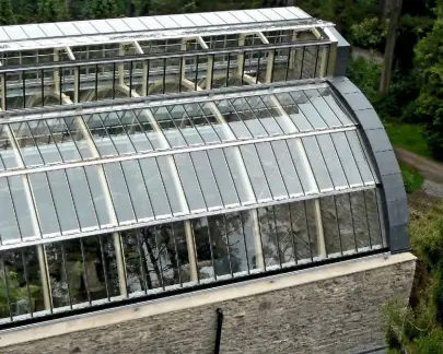  ??  ?? The restored glazed roof is stronger than the original, protecting the ferns from the elements while providing light and ventilatio­n.