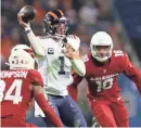  ?? JAMIE SABAU/USA TODAY SPORTS ?? Bears quarterbac­k Justin Fields (1) attempts to throw against the Cardinals at Soldier Field on Dec. 24.