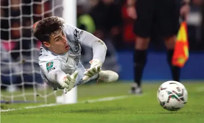  ?? Paul Childs/Action Images/Reuters ?? Chelsea's Kepa Arrizabala­ga saves a penalty from Theo Walcott during the Carabao Cup win over Southampto­n in a shootout. Photograph: