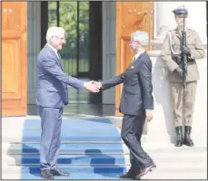  ??  ?? Polish Foreign Minister Jacek Czaputowic­z, (left), shakes hands with his counterpar­t from India Subrahmany­am Jaishankar, as he arrives at the Palace on
the Isle in Lazienki park in Warsaw, Poland on Aug 29. (AP)