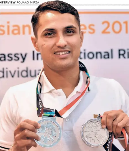  ?? V. SREENIVASA MURTHY ?? Targetting gold: Fouaad Mirza with his two 2018 Asian Games silver medals.