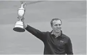  ?? IAN RUTHERFORD/USA TODAY SPORTS ?? Jordan Spieth holds the Claret Jug after winning the British Open at Royal Birkdale Golf Club on Sunday.