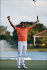  ?? WILFREDO LEE — THE ASSOCIATED PRESS ?? Rickie Fowler celebrates after winning the Honda Classic golf tournament, Sunday in Palm Beach Gardens, Fla.