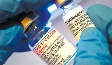  ?? Dpa-BILD: Puchner ?? Streit um Impfstoffe: die Ampullen mit den Vakzinen der Hersteller Moderna (links) und Biontech