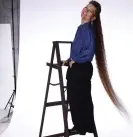  ?? ?? Tami Manis of Knoxville, Tennessee, boasts the globe’s longest mullet on a female: 5ft 8in (172.7cm), according to Guinness world records. Photograph: Guinness World Records/Guinness World Records video screengrab