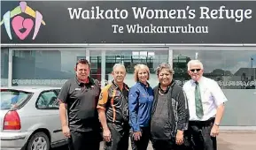  ??  ?? Mitre 10, Z Energy and New World representa­tives are pleased to be helping those from the Waikato Women’s Refuge by raising money.