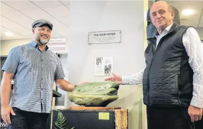  ?? PHOTO: LUISA GIRAO ?? Public art . . . A touchstone from Southland artist Johnny Penisula was given to the city by the ILT to celebrate the trust’s 75th birthday. The artist’s son, Lyle Penisula (left), and ILT chairman Alan Dennis unveil the piece.