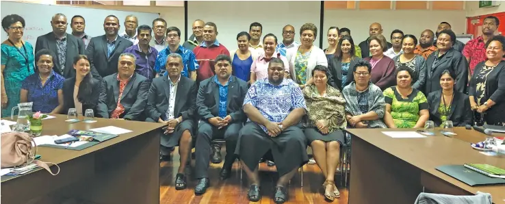  ??  ?? Permanent Secretary for Agricultur­e David Kolitagane (seated fifth from left), with participan­ts of the Reserve Bank of Fiji Stakeholde­r Engagement Workshop in Suva on July 6, 2018.