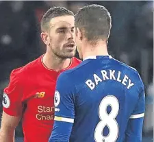  ??  ?? Liverpool’s Jordan Henderson and Everton’s Ross Barkley exchange words during the derby at Goodison Park.