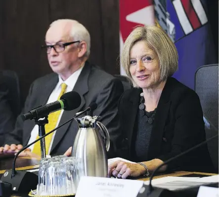  ?? GREG SOUTHAM ?? Former Syncrude Canada president Jim Carter listens as Premier Rachel Notley speaks at the first meeting of the Market Access Task Force in Edmonton on Wednesday.