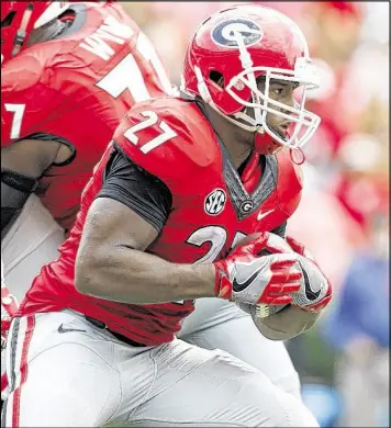  ?? AP ?? Last season Georgia’s Nick Chubb, coming off a terrible knee injury in 2015, was not running at his top speed. He hopes to be back to full strength in 2017.