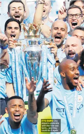  ??  ?? City players celebrate with the title last term... and they could do it again