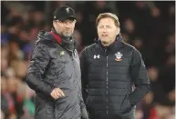  ??  ?? Pressing matters ...Jurgen Klopp (left) and Ralph Hasenhuttl