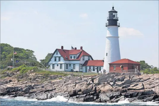  ?? [STEVE STEPHENS/DISPATCH PHOTOS] ?? Portland Head Lighthouse is one of many attraction­s in pretty Portland, Maine.