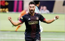  ?? MIGUEL MARTINEZ/AJC 2022 ?? Atlanta United defender Juanjo Purata, who was brought in on loan last season, reacts after scoring the team’s first goal against Orlando on July 17 at Mercedes-benz Stadium.