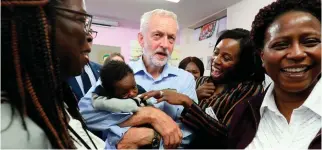  ?? PHOTO: SIMON DAWSON/ ?? Impossible tests: Labour leader Jeremy Corbyn meets people at a centre for the long-term unemployed in Essex yesterday.