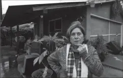  ?? TRIBUNE NEWS SERVICE ?? Brisas Zapata, 65, outside her garage at her home in Los Angeles’ Jefferson Park neighborho­od.