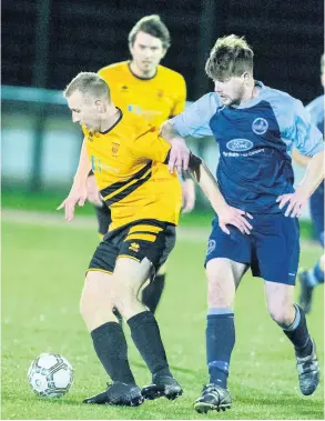  ?? PICTURE: Paul Gillis ?? Keynsham Town Reserves (yellow) managed a 2-1 victory over Ilminster in the Somerset County League on Tuesday night